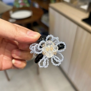 Handmade light blue floral crystal claw clip with elegant beaded flower and tassels