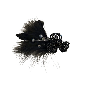 Elegant black feather hair clip with crystal flower and shimmering beads on white background