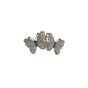 Exquisite butterfly spring hair clip with sparkling crystals and navy blue accents
