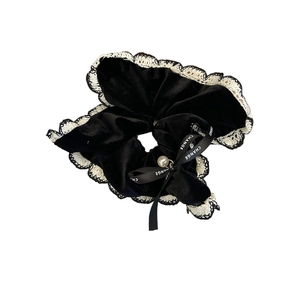 Elegant black velvet scrunchie with lace trim, ribbon bow, and pearl detail