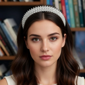 Close-up detail of silver luxury headband with sparkling crystals and rhinestones for women