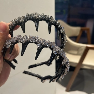 Detail of high crown headband featuring faceted crystals and anti-slip comb teeth
