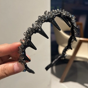 Rock style crystal headband with grey rhinestones and black spikes for high skull top look