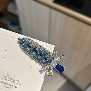 Elegant Korean style crystal beaded hair clip with S925 silver bow on white display card