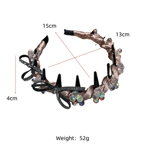 Detail of rose gold satin headband with rhinestones, sequins and grip clips, 15cm size