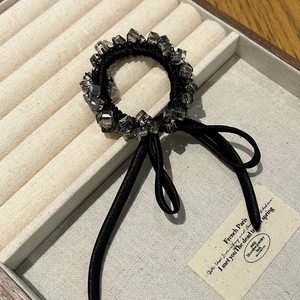 Elegant crystal beaded hair tie with black silk ribbons and faceted gray stones