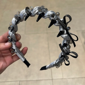 Braided silver grey headband with crystal beads and sparkling black bow detail
