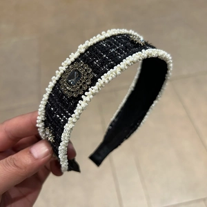 Elegant black tweed headband with white pearls and vintage star gemstone ornament