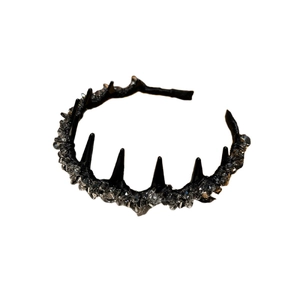Gothic black headband featuring sparkling crystal accents and edgy dark spikes for women
