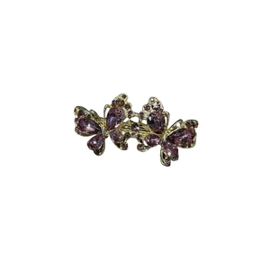 Eleganter goldener Schmetterlings-Haarclip mit lila Strasssteinen für Damen