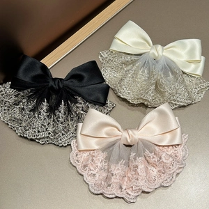 Detailed set of three French chic satin bow hair clips with delicate lace embroidery