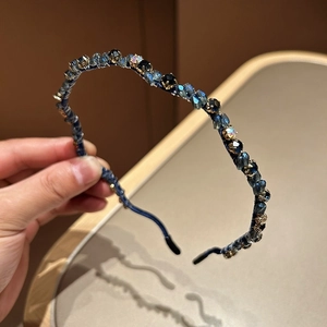 Eleganter Kristall-Strass-Haarreif mit blauen Edelsteinen und goldener Fassung