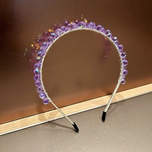 Elegant purple crystal beaded headband with iridescent facets and silver metal frame