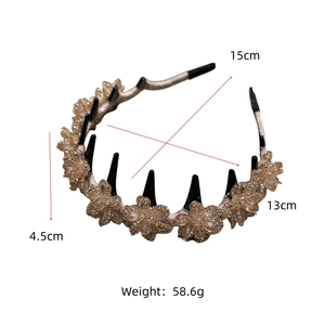 Detail view of crystal flower headband with side comb teeth and size measurements