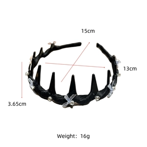 Detail view of black non-slip headband with silver bow decoration and dimensions