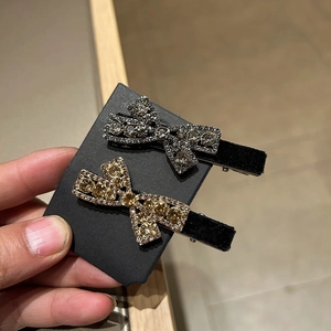 Sparkling velvet bow hair clips with rhinestones in champagne gold and silver grey