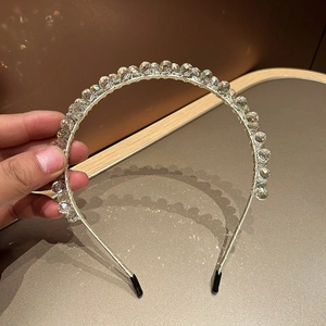 Luxurious handmade crystal beaded headband featuring sparkling transparent multi-faceted gems