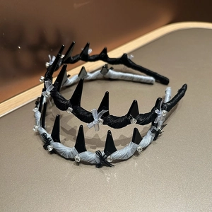 Detailed close-up of non-slip headbands with bow accents and sparkling rhinestones