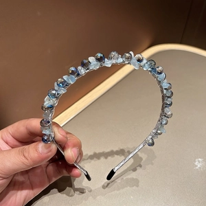 Handmade beaded crystal headband featuring blue-grey faceted glass beads and wrapped silver wire