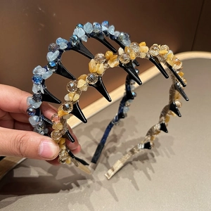 Detail of beaded wave headbands with colorful stones and anti-slip shark teeth comb
