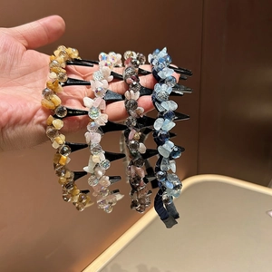 Detail of crystal braided headbands with clips for securing hair in various colors