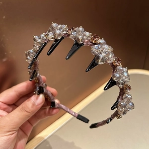 Elegant crystal headband with purple satin fabric and intricate hand-sewn rhinestones