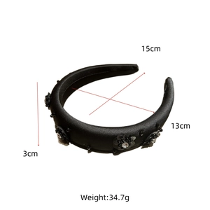 Detail showing dimensions of black sequin flower headband with rhinestones and thick sponge