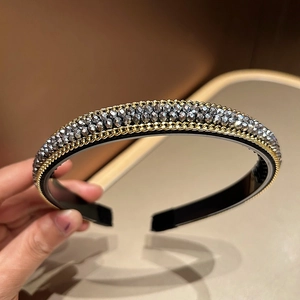 Elegant beaded headband with grey crystals and gold chain trim for a luxury retro style