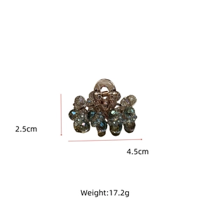 Detail view of crystal hair claw clip showing dimensions 4.5cm width and 2.5cm height