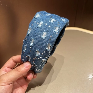 Retro wide blue denim headband with silver sequins and distressed square hole details