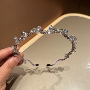 Detailed macro view of the lavender headband featuring sparkling crystals and beads