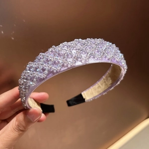 Detail of light purple beaded headband featuring crystal beads and non-slip rubber ends