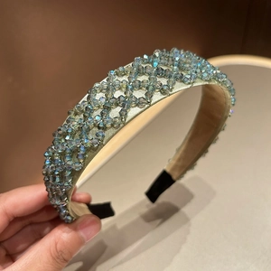 Handmade beaded wide headband with grey-blue crystals on light green satin fabric
