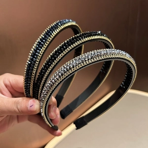 Detailed macro view of beaded crystal headbands with anti-slip teeth and golden chain