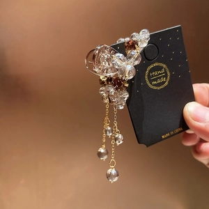 Sparkling crystal tassel hair claw with amber beads and gold hanging chains
