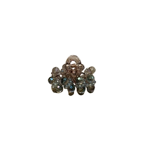 Luxurious crystal hair claw clip with rose gold metal base and floral bead pattern