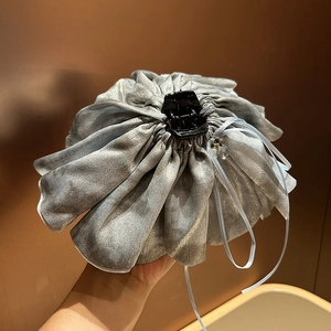 Elegant oversized silver-grey satin hair claw clip with pleated ruffles and ribbon detail
