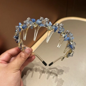 Blue crystal and resin headband with integrated hair clips for versatile styling