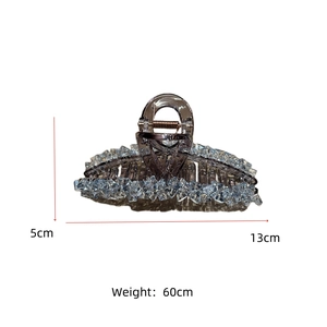 Detailed view of crystal beaded hair claw clip with 13cm length and 5cm height dimensions