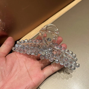 Elegant champagne gold shark hair clip with sparkling blue crystal beads for women