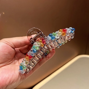 Sparkling crystal shark hair claw clip in amber brown resin for thick hair