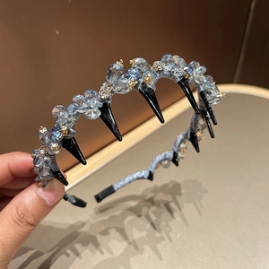 Luxurious crystal headband with grey fabric and golden floral accents for women