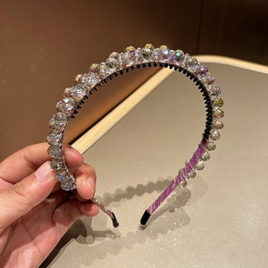 Detail view of double-layer crystal headband with faceted beads and silk-wrapped ends