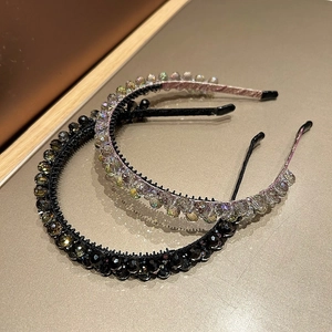 Detailed macro view of dual-layer crystal headbands with non-slip teeth for secure styling