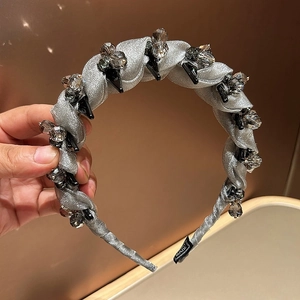 Silver woven headband with sparkling crystal beads for a high cranium top style