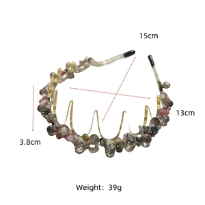Detail view of wave-shaped headband showing 15cm height and crystal bead textures