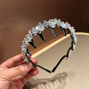 Detail view of crystal headband with non-slip teeth for elegant hair styling