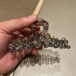 Handcrafted grey crystal hair claw clip with rhinestones for elegant styling
