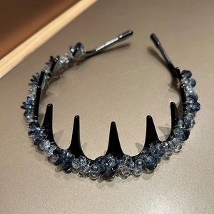 Detail of blue-gray crystal beads hand-wrapped on a non-slip black serrated headband