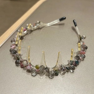 Detailed view of luxury non-slip headband with colorful crystals and acrylic teeth